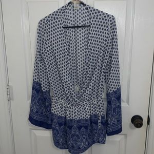 ROMPER. the button to pin up the front is missing but I usually wore a bralette